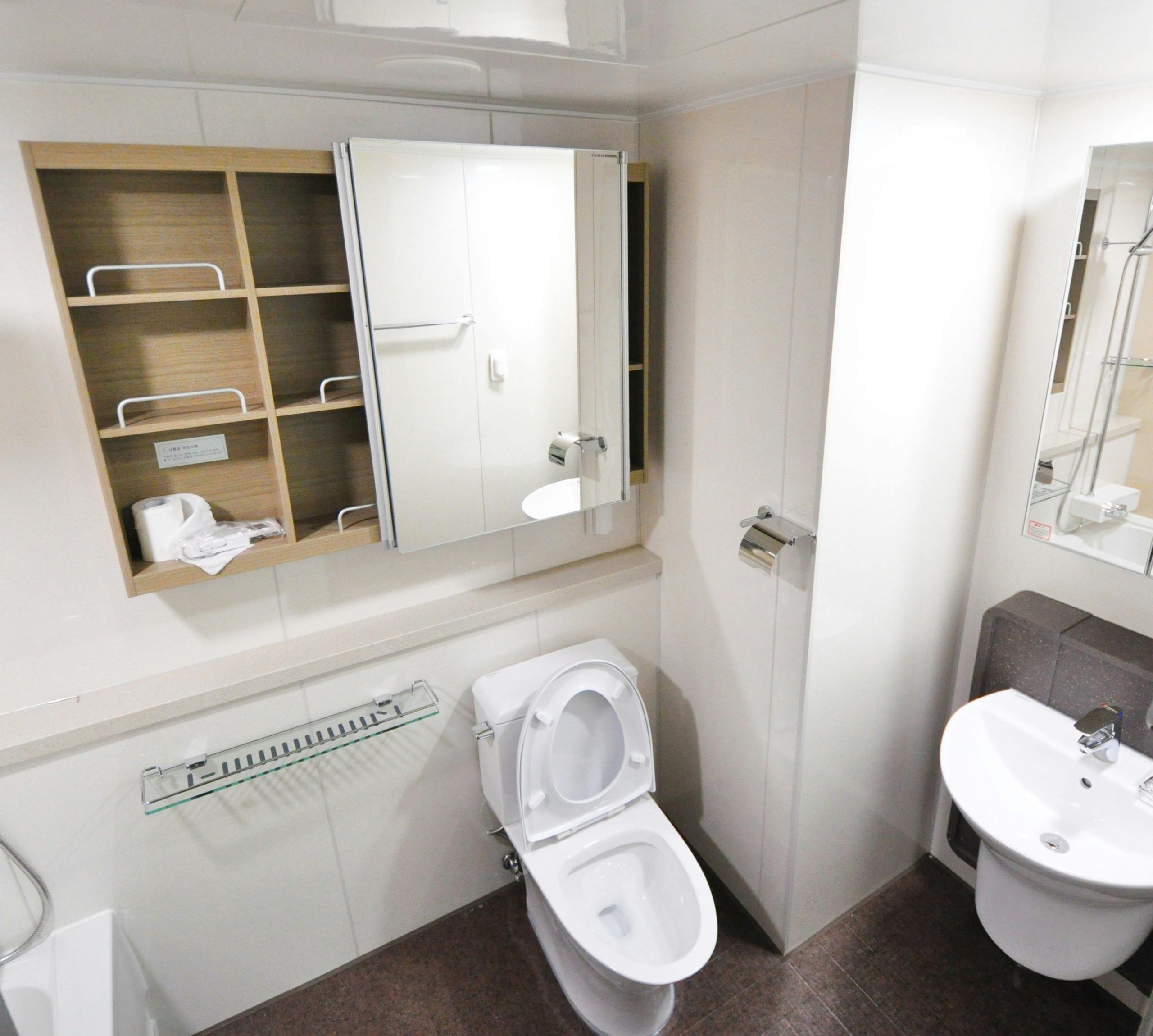 aerial view of a bathroom showing a toilet and a sink